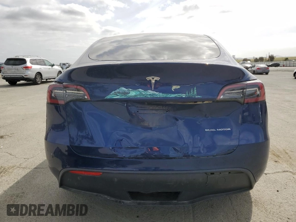 2021 Tesla Model Y Long Range with VIN 5YJYGDEEXMF192447, listed as a Copart auction lot 53550055 with 65,673 mi miles and Salvage Title. Bid and sale history available at DreamBid. Image 6.