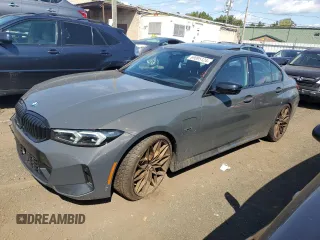 2023 BMW 3 Series 330e xDrive with VIN 3MW39FS03P8D13236, listed as a Copart auction lot 69095124 with 19,607 mi miles and Salvage Title. Bid and sale history available at carsss.com. Image 1.