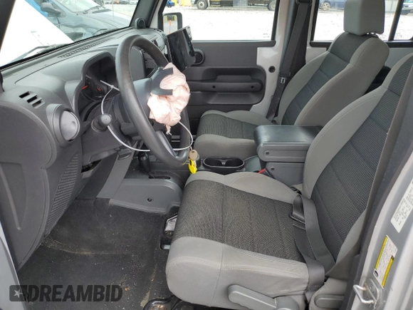 2007 Jeep Wrangler Unlimited X with VIN 1J4GA39117L169245, listed as a Copart auction lot 56731665 with 136,247 mi miles and Salvage title. Bid and sale history available at DreamBid. Image 7.