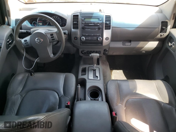 2010 Nissan Frontier Pro-4X with VIN 1N6AD0EV1AC447205, listed as a Copart auction lot 62007355 with 128,371 mi miles and Clean title. Bid and sale history available at DreamBid. Image 8.