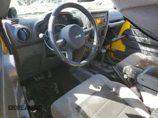 2008 Jeep Wrangler Unlimited X with VIN 1J4GA39158L621957, listed as a Copart auction lot 52737815 with 135,489 mi miles and Salvage title. Bid and sale history available at DreamBid. Image 8.