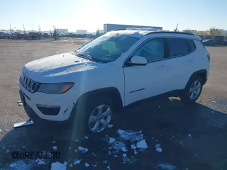 2019 Jeep Compass Latitude with VIN 3C4NJDBB5KT704564, listed as a IAAI auction lot 40768531 with 95,291 mi miles. Bid and sale history available at carsss.com. Image 17.