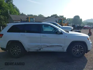2017 Jeep Grand Cherokee Trailhawk with VIN 1C4RJFLG2HC670868, listed as a IAAI auction lot 42711041 with 129,465 mi miles and . Bid and sale history available at DreamBid. Image 13.