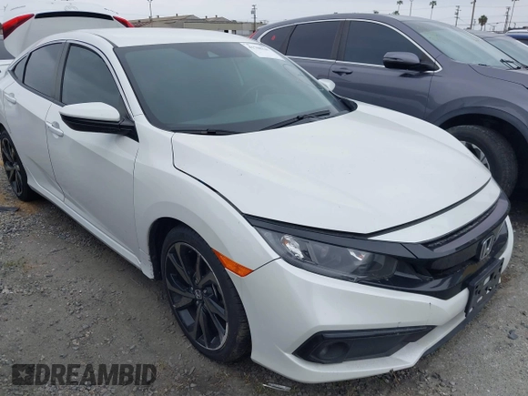2019 Honda Civic Sport with VIN 2HGFC2F85KH512587, listed as a IAAI auction lot 41708347 with 63,895 mi miles and . Bid and sale history available at DreamBid. Image 1.