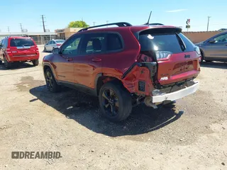 2019 Jeep Cherokee Latitude Plus with VIN 1C4PJMLB7KD384984, listed as a IAAI auction lot 42243845 with 60,914 mi miles and . Bid and sale history available at DreamBid. Image 3.