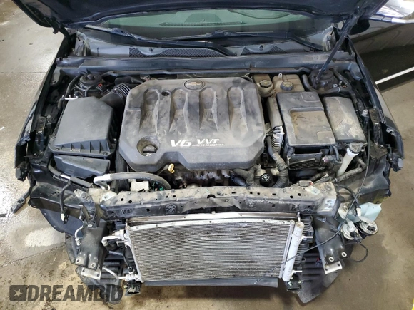 2014 Chevrolet Impala LTZ with VIN 2G1155S31E9275036, listed as a Copart auction lot 52099875 with 87,719 mi miles and Salvage title. Bid and sale history available at DreamBid. Image 12.