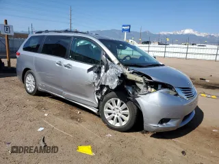2012 Toyota Sienna XLE with VIN 5TDDK3DC5CS044711, listed as a Copart auction lot 58189195 with 112,172 mi miles and Salvage title. Bid and sale history available at DreamBid. Image 4.