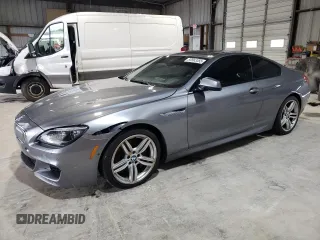 2015 BMW 6 Series 650i xDrive z VIN WBAYM1C53FD325311, wystawiony jako Copart lot #59563355 z przebiegiem 157 675 mil mil oraz Czysty tytuł • Clean title. Historia ofert i sprzedaży dostępna na DreamBid. Obrazek 1.