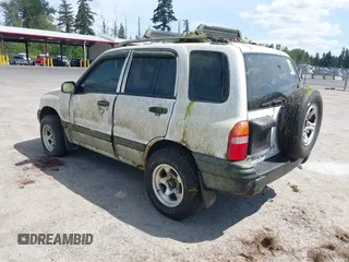 2002 Chevrolet Tracker z VIN 2CNBJ13C726919100, wystawiony jako IAAI lot #42309454 z przebiegiem Nie podano mil oraz . Historia ofert i sprzedaży dostępna na DreamBid. Obrazek 3.