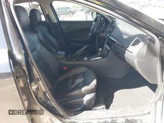 2015 Mazda 6 i Grand Touring with VIN JM1GJ1W59F1179548, listed as a IAAI auction lot 42004860 with 153,532 mi miles and . Bid and sale history available at DreamBid. Image 5.