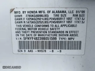 2009 Honda Pilot LX with VIN 5FNYF48239B051599, listed as a IAAI auction lot 41889469 with 999,999 mi miles. Bid and sale history available at carsss.com. Image 9.