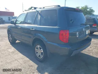 2003 Honda Pilot EX with VIN 2HKYF18533H612563, listed as a IAAI auction lot 41986321 with 259,252 mi miles. Bid and sale history available at carsss.com. Image 3.
