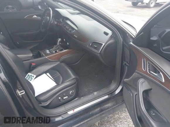 2016 Audi S6 Prestige z VIN WAUH2AFC4GN177293, wystawiony jako IAAI lot #41549559 z przebiegiem 79 715 mil mil oraz . Historia ofert i sprzedaży dostępna na DreamBid. Obrazek 5.
