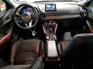 2017 Mazda CX-3 Grand Touring z VIN JM1DKFD71H0141595, wystawiony jako Copart lot #54377305 z przebiegiem 60 907 mil mil oraz Szkody całkowita. Historia ofert i sprzedaży dostępna na DreamBid. Obrazek 8.
