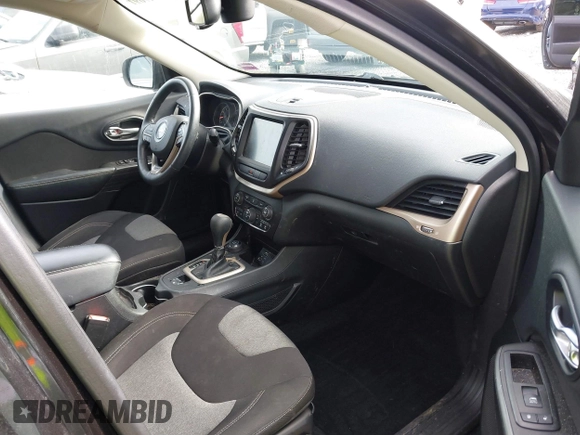 2014 Jeep Cherokee Latitude with VIN 1C4PJMCS0EW169696, listed as a IAAI auction lot 41647691 with 98,919 mi miles. Bid and sale history available at carsss.com. Image 5.