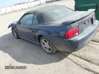 2001 Ford Mustang Deluxe with VIN 1FAFP44451F130290, listed as a IAAI auction lot 41777828 with 1 mi miles. Bid and sale history available at carsss.com. Image 3.