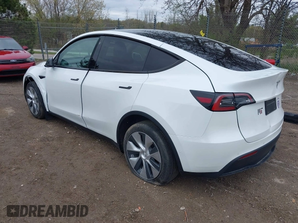 2022 Tesla Model Y Long Range with VIN 7SAYGDEE1NF421098, listed as a IAAI auction lot 42177555 with 55,855 mi miles and . Bid and sale history available at carsss.com. Image 3.