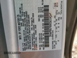 2016 Ford Fusion S z VIN 3FA6P0G70GR265543, wystawiony jako Copart lot #59754105 z przebiegiem 133 713 mil mil oraz Szkoda całkowita • Salvage title. Historia ofert i sprzedaży dostępna na DreamBid. Obrazek 13.