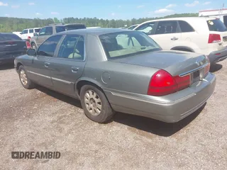 2003 Mercury Grand Marquis LS Premium z VIN 2MEFM75W53X691700, wystawiony jako IAAI lot #41952048 z przebiegiem 208 747 mil mil oraz . Historia ofert i sprzedaży dostępna na DreamBid. Obrazek 3.