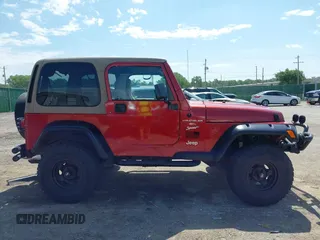 1999 Jeep Wrangler Sport with VIN 1J4FY19S2XP423638, listed as a IAAI auction lot 42553626 with 120,690 mi miles and . Bid and sale history available at DreamBid. Image 13.