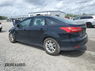 2016 Ford Focus SE with VIN 1FADP3F21GL248456, listed as a Copart auction lot 51583335 with 134,313 mi miles and Salvage title. Bid and sale history available at DreamBid. Image 2.