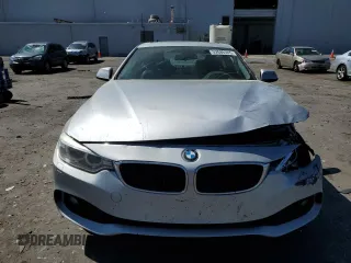 2014 BMW 4 Series 428i xDrive with VIN WBA3N5C51EF716572, listed as a Copart auction lot 52086365 with 209,742 mi miles and Salvage Title. Bid and sale history available at DreamBid. Image 5.