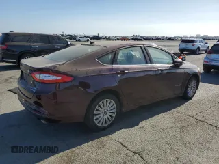 2013 Ford Fusion SE Hybrid z VIN 3FA6P0LU6DR365363, wystawiony jako Copart lot #62325625 z przebiegiem 226 624 mil mil oraz Czysty tytuł • Clean title. Historia ofert i sprzedaży dostępna na DreamBid. Obrazek 3.