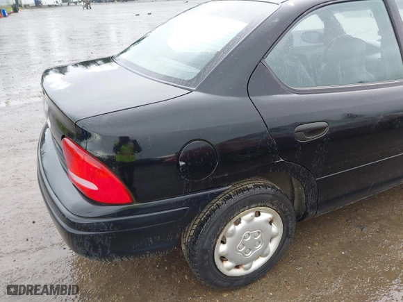 1997 Dodge Neon with VIN 1B3ES27C3VD261832, listed as a IAAI auction lot 41964028 with 220,237 mi miles. Bid and sale history available at carsss.com. Image 6.