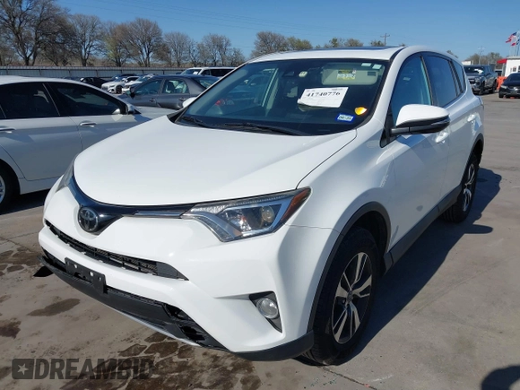 2018 Toyota RAV4 XLE z VIN 2T3WFREV3JW483398, wystawiony jako IAAI lot #41740776 z przebiegiem 70 640 mil mil oraz . Historia ofert i sprzedaży dostępna na DreamBid. Obrazek 2.