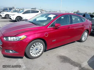 2014 Ford Fusion Energi SE Luxury with VIN 3FA6P0PUXER234528, listed as a IAAI auction lot 41644935 with 151,059 mi miles. Bid and sale history available at carsss.com. Image 2.