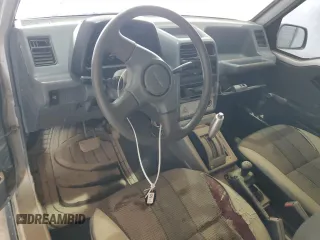 1990 Geo Tracker z VIN 2CNBJ18UXL6218795, wystawiony jako Copart lot #53083615 z przebiegiem 83 413 mil mil oraz Szkody całkowita. Historia ofert i sprzedaży dostępna na DreamBid. Obrazek 8.