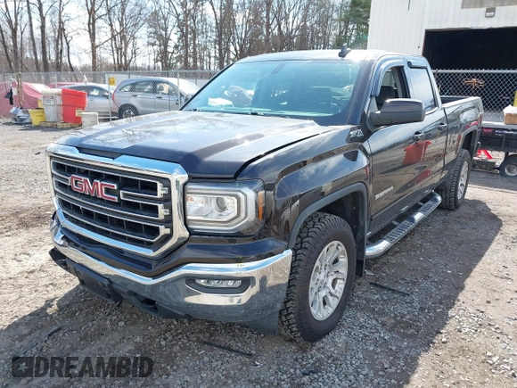 2018 GMC Sierra 1500 SLE z VIN 1GTV2MEC3JZ143967, wystawiony jako IAAI lot #41853850 z przebiegiem 80 205 mil mil oraz . Historia ofert i sprzedaży dostępna na DreamBid. Obrazek 6.