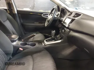 2019 Nissan Sentra S z VIN 3N1AB7AP3KY368736, wystawiony jako IAAI lot #42283123 z przebiegiem 89 117 mil mil oraz . Historia ofert i sprzedaży dostępna na DreamBid. Obrazek 5.