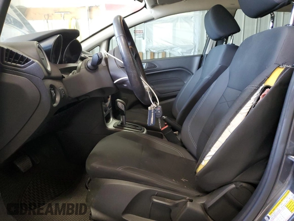 2015 Ford Fiesta SE z VIN 3FADP4BJ9FM166796, wystawiony jako Copart lot #54308455 z przebiegiem 42 875 mil mil oraz Nie do naprawy • Non repairable. Historia ofert i sprzedaży dostępna na DreamBid. Obrazek 7.