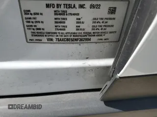 2022 Tesla Model X with VIN 7SAXCBE52NF362994, listed as a Copart auction lot 49850475 with 55,506 mi miles and Salvage Title. Bid and sale history available at DreamBid. Image 14.