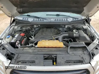 2015 Ford F-150 XLT с VIN 1FTEW1EG7FFA86557, выставлен на аукционе Copart как лот 55927575 с пробегом 124 812 миль миль и Списание • Salvage title. История ставок и продаж доступна на DreamBid. Изображение 11.