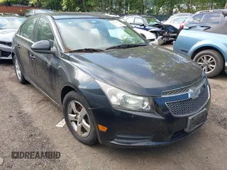 2014 Chevrolet Cruze 1LT with VIN 1G1PC5SB8E7210158, listed as a IAAI auction lot 42729599 with 106,400 mi miles and . Bid and sale history available at DreamBid. Image 1.