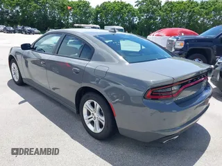2023 Dodge Charger SXT with VIN 2C3CDXBG5PH638680, listed as a IAAI auction lot 39678284 with 24,364 mi miles. Bid and sale history available at carsss.com. Image 3.