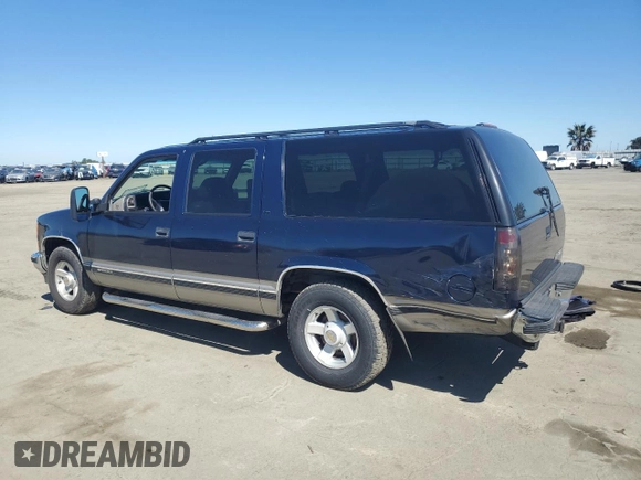 1999 Chevrolet Suburban with VIN 1GNEC16R1XJ394144, listed as a Copart auction lot 50418185 with 173,037 mi miles and Salvage title. Bid and sale history available at DreamBid. Image 2.