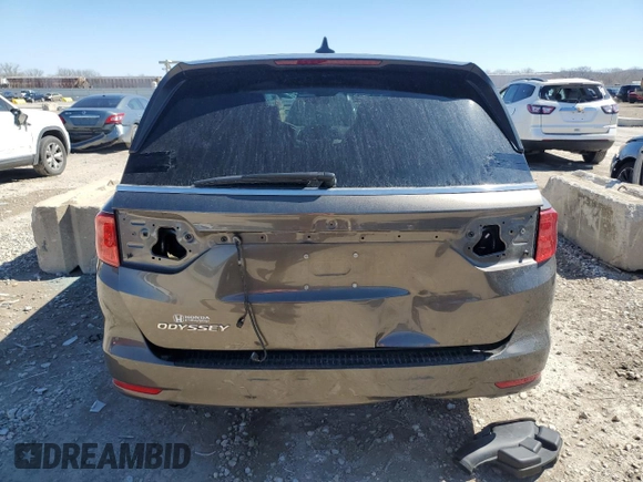 2018 Honda Odyssey EX-L with VIN 5FNRL6H78JB069850, listed as a Copart auction lot 49771875 with 103,914 mi miles and Salvage Title. Bid and sale history available at DreamBid. Image 6.