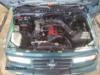 1996 Chevrolet Tracker z VIN 2CNBJ1869T6903842, wystawiony jako Copart lot #87734315 z przebiegiem 120 835 mil mil oraz Szkoda całkowita • Salvage title. Historia ofert i sprzedaży dostępna na DreamBid. Obrazek 12.