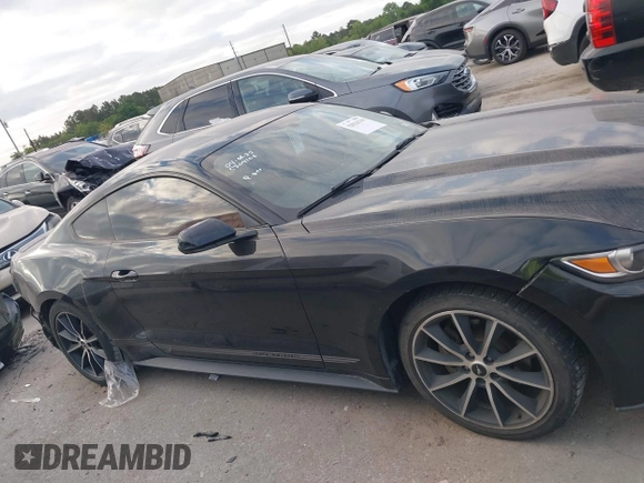 2016 Ford Mustang EcoBoost z VIN 1FA6P8THXG5267039, wystawiony jako IAAI lot #42014319 z przebiegiem 103 936 mil mil oraz . Historia ofert i sprzedaży dostępna na DreamBid. Obrazek 14.