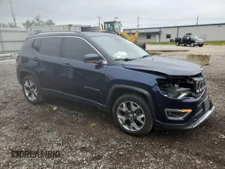 2018 Jeep Compass Limited with VIN 3C4NJDCB4JT128687, listed as a Copart auction lot 57648245 with 136,455 mi miles and Salvage title. Bid and sale history available at DreamBid. Image 4.