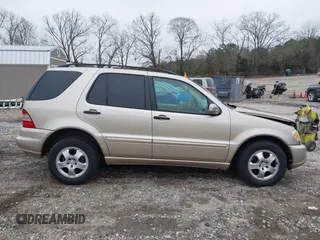 2003 Mercedes-Benz M-Class 3.2L with VIN 4JGAB54E43A383811, listed as a IAAI auction lot 41204136 with 209,327 mi miles. Bid and sale history available at carsss.com. Image 13.