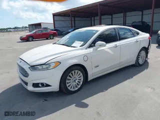 2014 Ford Fusion Energi Titanium with VIN 3FA6P0SU0ER149155, listed as a IAAI auction lot 41519306 with 148,406 mi miles. Bid and sale history available at carsss.com. Image 2.