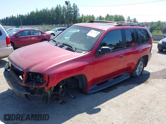 2002 GMC Envoy SLT z VIN 1GKDT13S022518682, wystawiony jako IAAI lot #42441658 z przebiegiem Nie podano mil oraz . Historia ofert i sprzedaży dostępna na DreamBid. Obrazek 2.