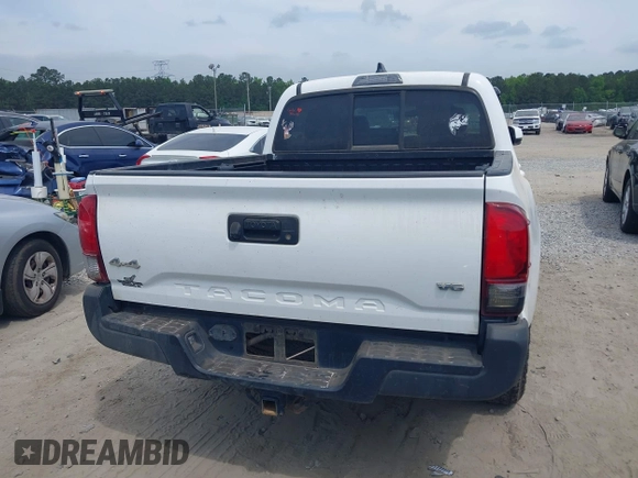 2022 Toyota Tacoma SR with VIN 3TYCZ5AN9NT098903, listed as a IAAI auction lot 42088505 with 93,000 mi miles and . Bid and sale history available at DreamBid. Image 16.