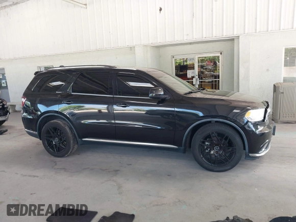 2016 Dodge Durango SXT with VIN 1C4RDHAG3GC301666, listed as a IAAI auction lot 42264091 with 100,769 mi miles and . Bid and sale history available at DreamBid. Image 14.
