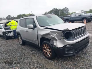 2017 Jeep Renegade Latitude z VIN ZACCJABB1HPF16811, wystawiony jako IAAI lot #41961507 z przebiegiem 146 367 mil mil oraz . Historia ofert i sprzedaży dostępna na DreamBid. Obrazek 1.