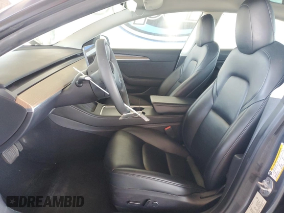 2023 Tesla Model 3 with VIN 5YJ3E1EA4PF456228, listed as a Copart auction lot 61442085 with 121,173 mi miles and Clean title. Bid and sale history available at DreamBid. Image 7.